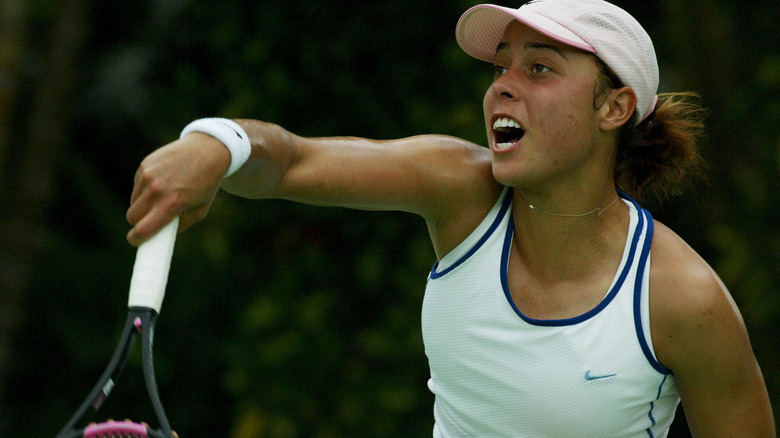 Alexandra Stevenson hits a serve