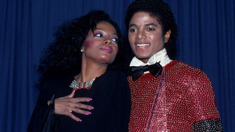 Diana Ross smiling at Michael Jackson