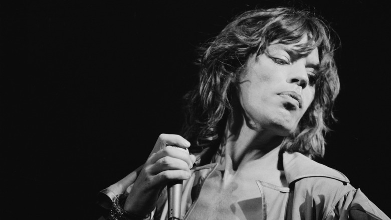Black and white photo of Mick Jagger in concert