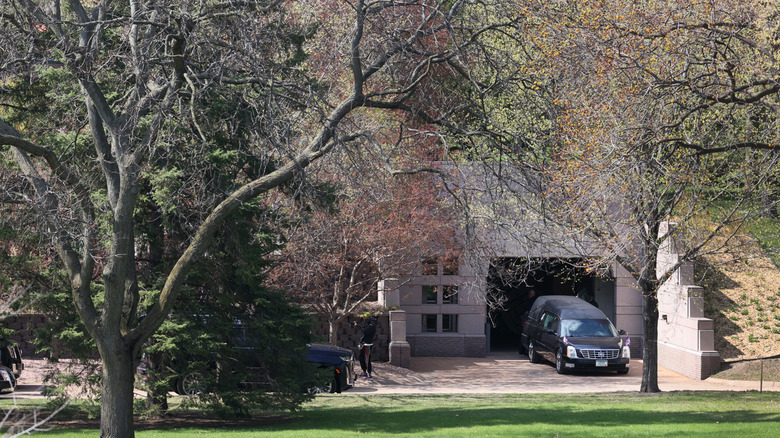 A hearse in the entry of a garage at a funeral home in Minnesota.