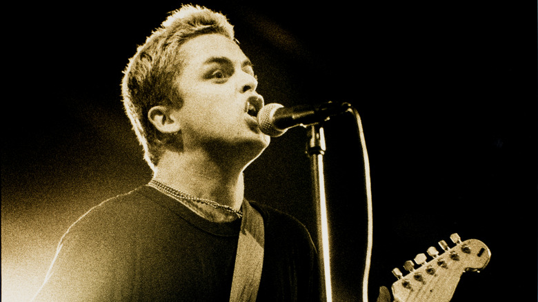 Picture of Billie Joe Armstrong performing on stage in the 1990s