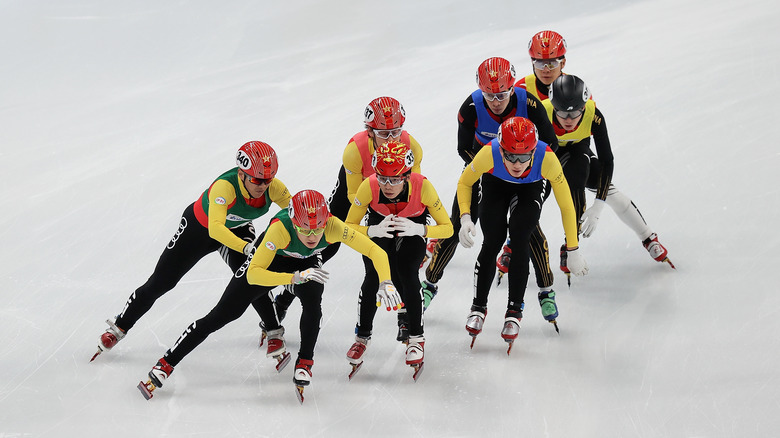 athletes skating on ice