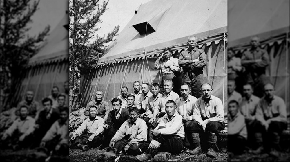 Interned Japanese men working on a road crew