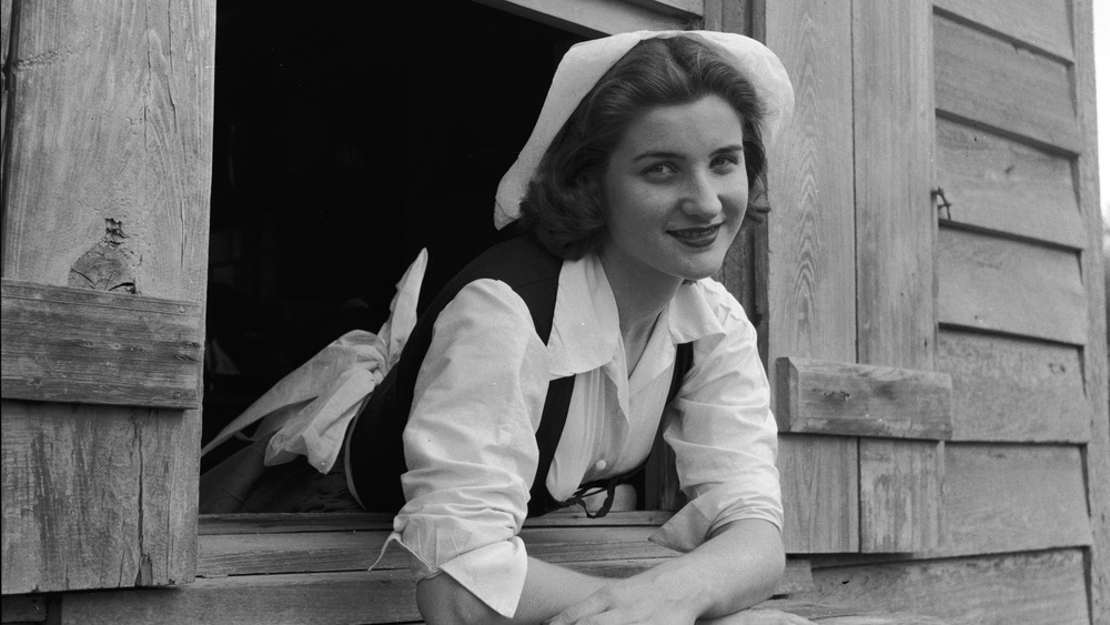 Woman in traditional Acadian dress