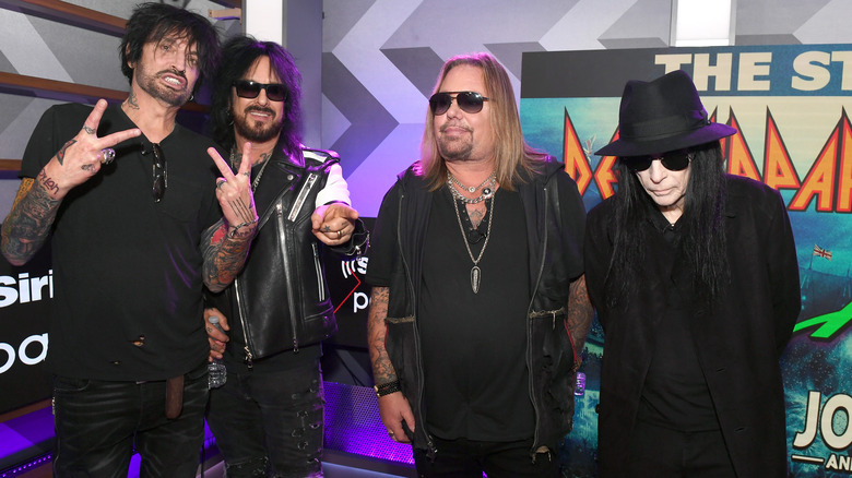 Motley Crue poses for photo