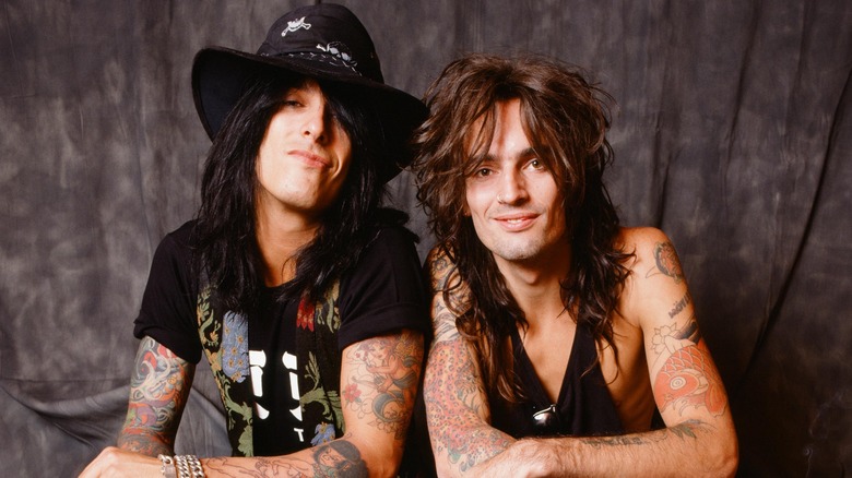 Nikki Sixx and Tommy Lee posing