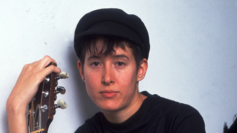 Michelle Shocked posing with guitar