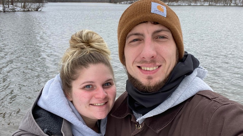 J.T. Smith taking a selfie by a lake