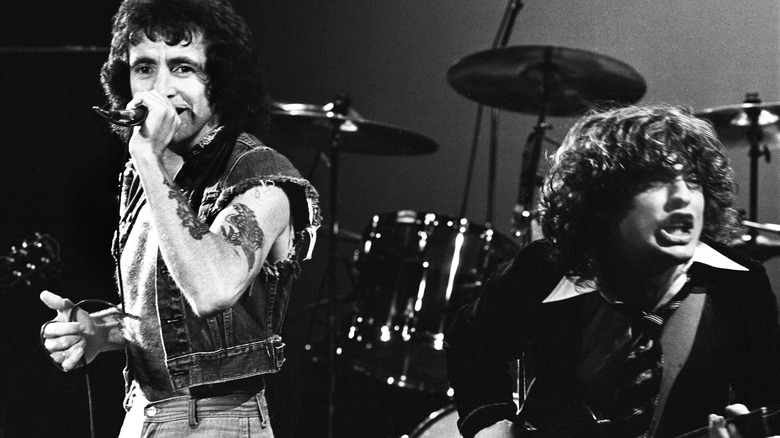 Bon Scott and Angus Young rock out in the '70s