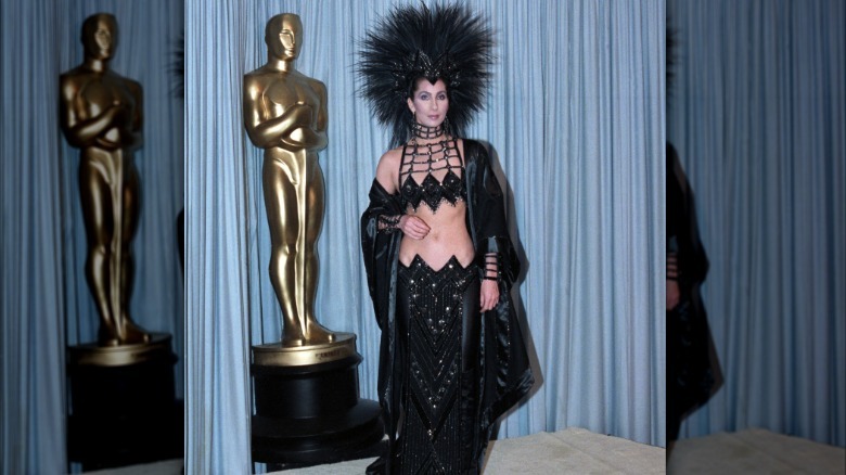 Cher black costume head dress at Oscars