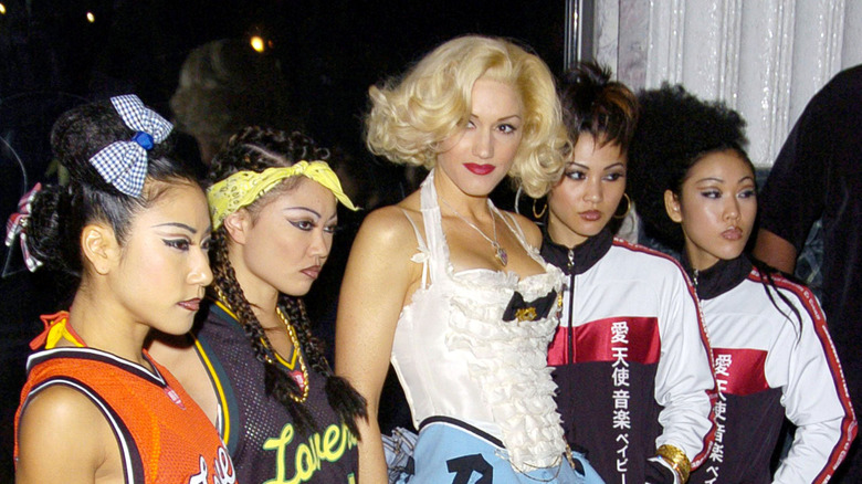 gwen stefani and her harajuku backers at a fashion event ca. 2004