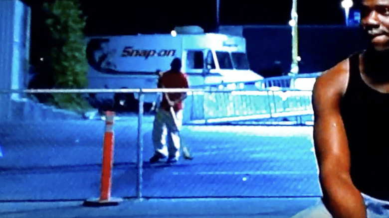 Guy sweeping nothing in Biker Boyz