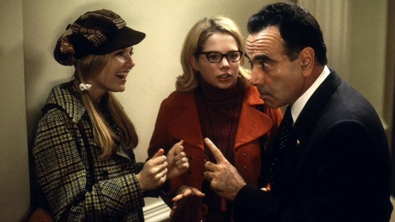 Kirsten Dunst, Michelle Williams, and Dan Hedaya as Richard NIxon