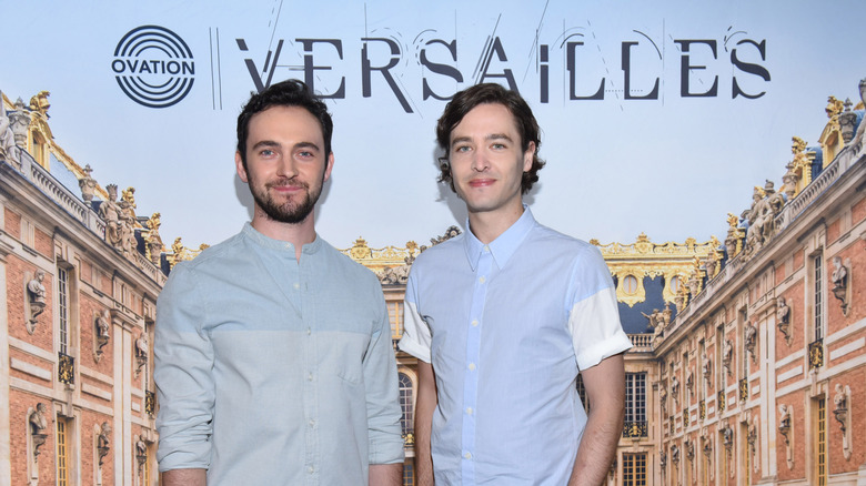 stars george blagden and alexander vlahos at versaillles photo call