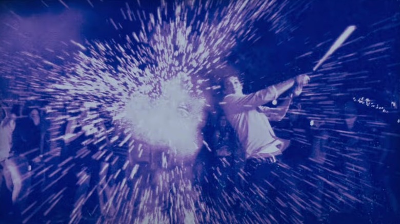 Project X teenager swinging a bat