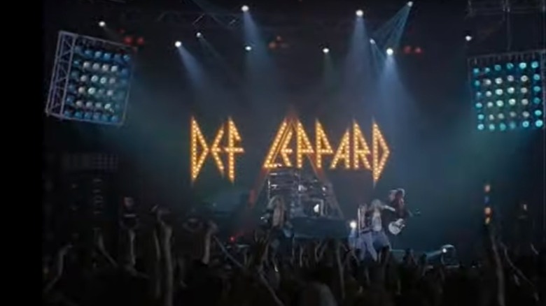 Screenshot of a Def Leppard concert in Hysteria: The Def Leppard Story