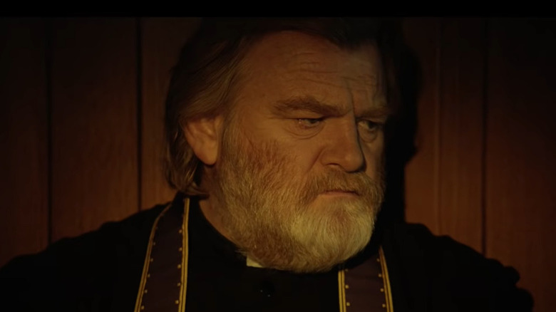 Fr. James in a confessional
