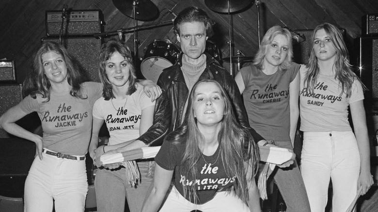 Manager Kim Fowley posing with the Runaways