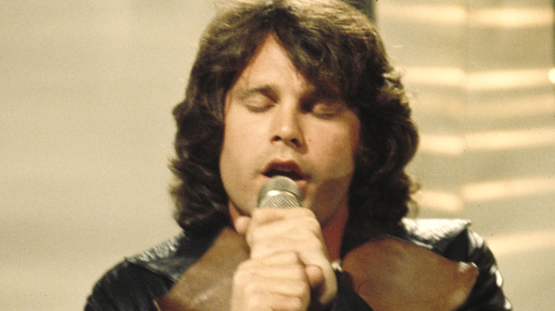 Jim Morrison singing with eyes closed