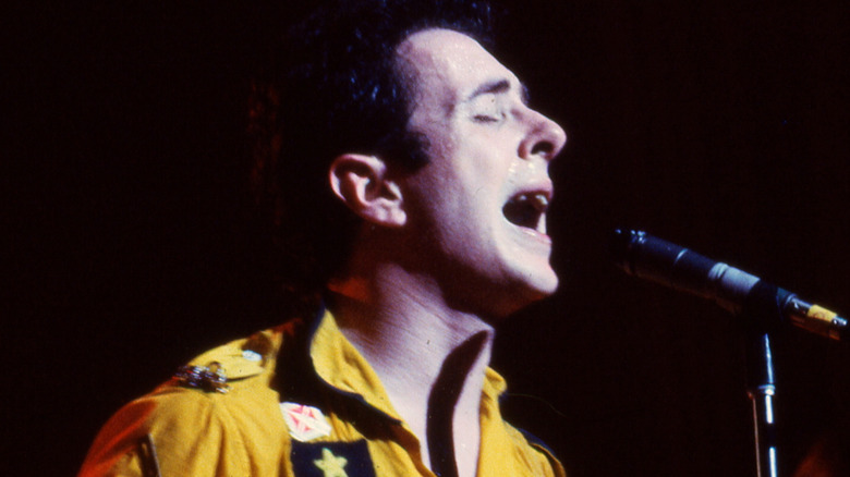 Joe Strummer singing on stage