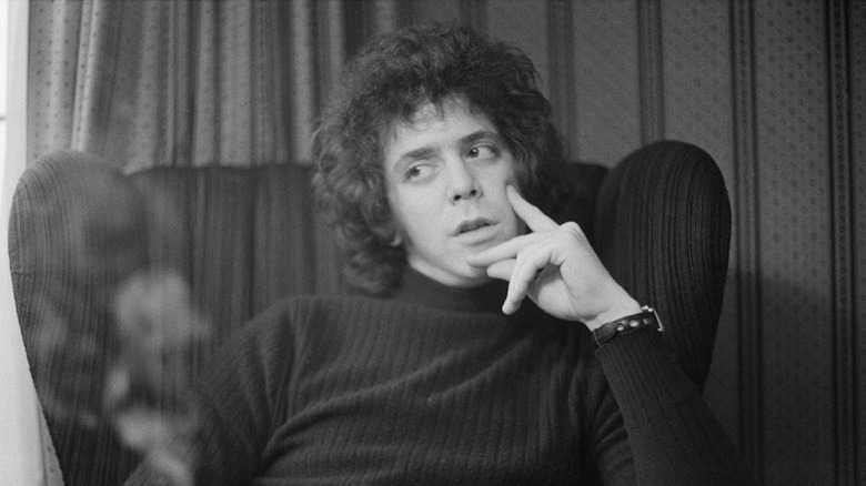 lou reed sitting in wingback chair 1972