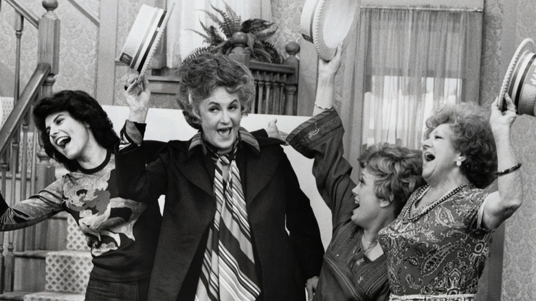 Bea Arthur performing a song and dance with three other women in the TV show "Maude"