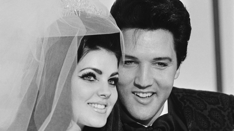 Priscilla and Elvis Presley at their wedding