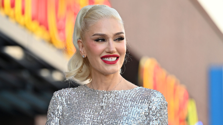 Gwen Stefani walking outdoors on a street in LA.