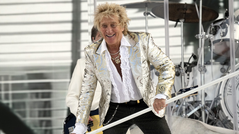 Rod Stewart performing during concert