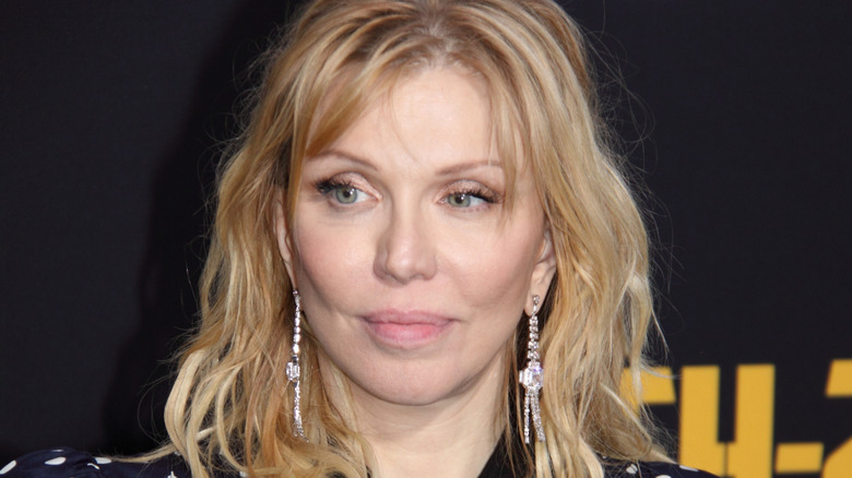 Courtney Love frowning