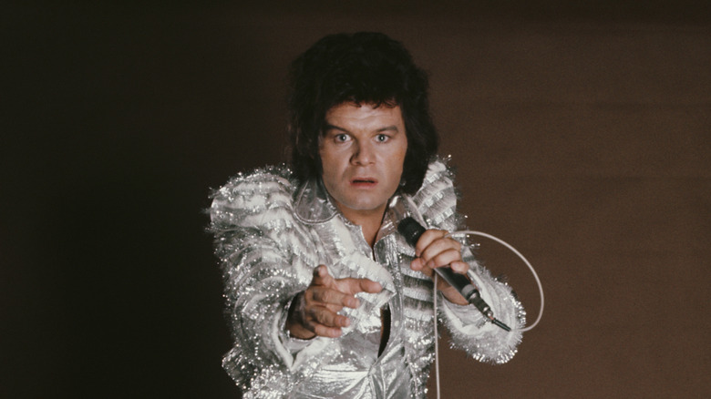 Gary Glitter in silver stage costume from 1970s