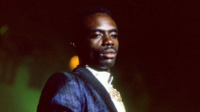 Ninjaman looking off while on stage