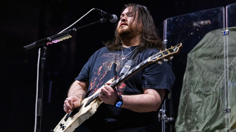 Wolfgang Van Halen playing guitar during a concert