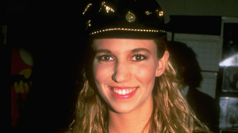 Debbie Gibson smiling in big hat