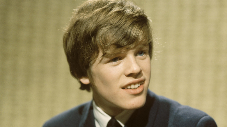 Peter Noone looking away in portrait