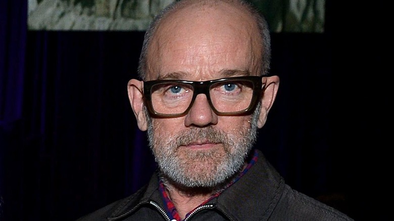 Michael Stipe looking glum in glasses