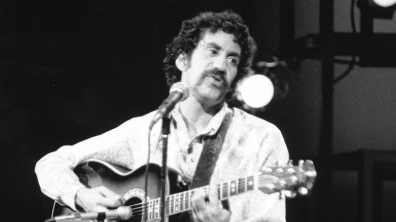 Jim Croce playing guitar onstage