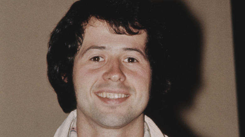 Wayne Osmond smiling in '70s headshot