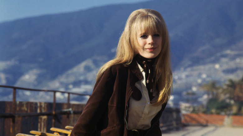 Marianne Faithfull posing on a ship
