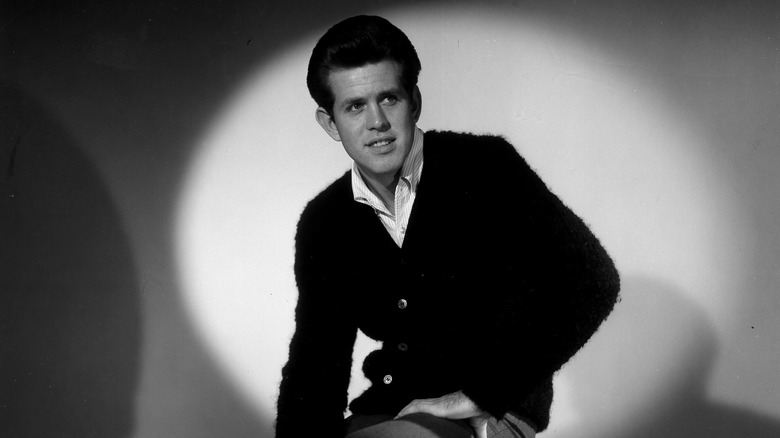 Terry Stafford in a spotlight posing