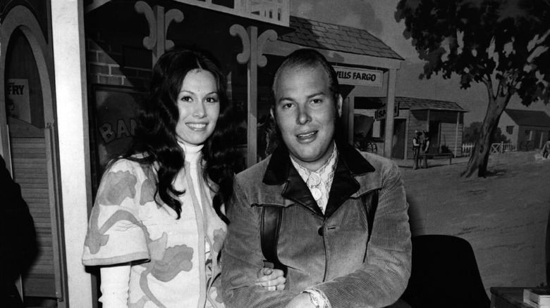 hank williams sat smiling with woman