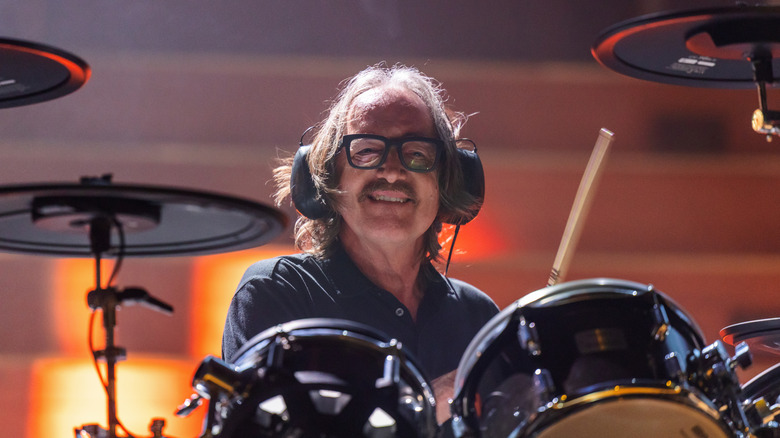 Butch Vig playing drums with Garbage