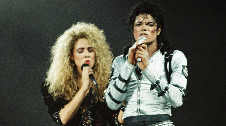 Sheryl Crow and Michael Jackson singing onstage