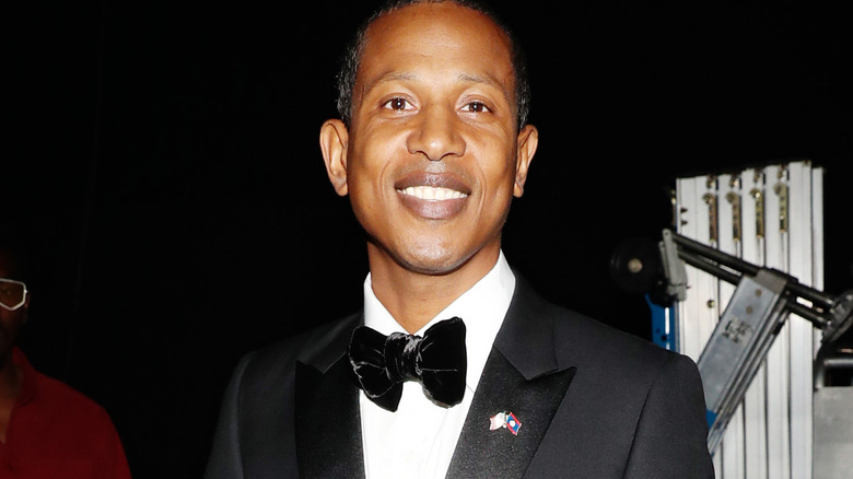 Shyne tuxedo bowtie smiling at event