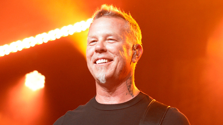 James Hetfield of Metallica smiling on stage
