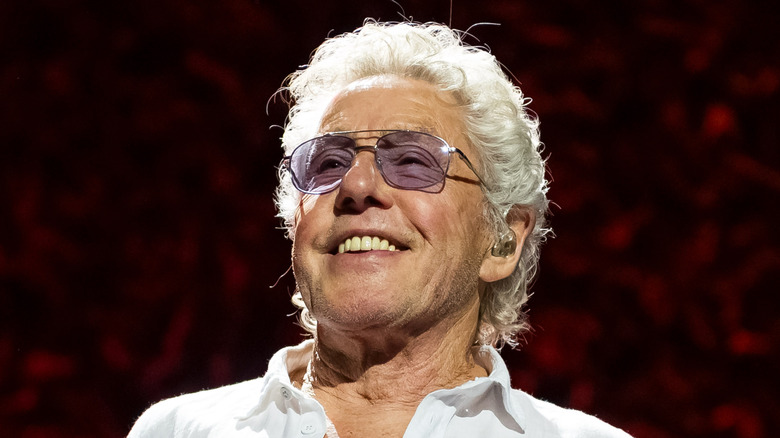 Roger Daltrey smiles on stage