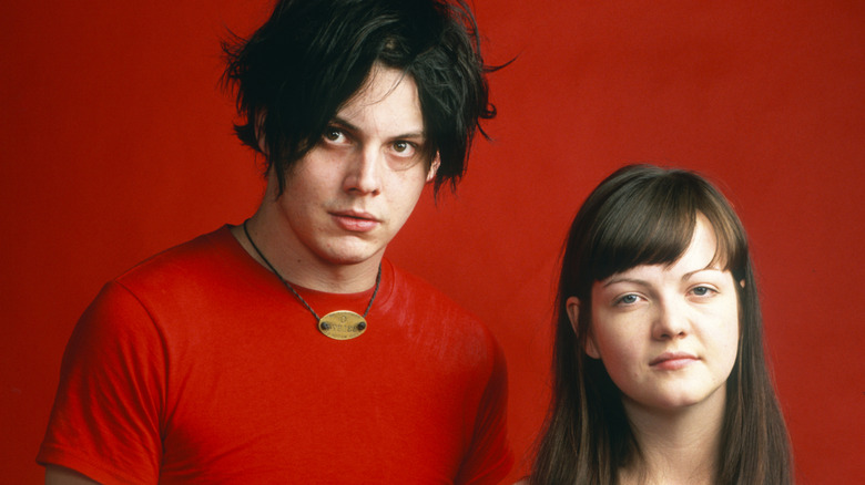 Jack White and Meg White staring at camera in early 2000s