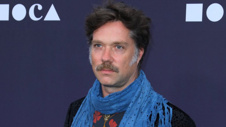 Rufus Wainwright wearing blue scarf
