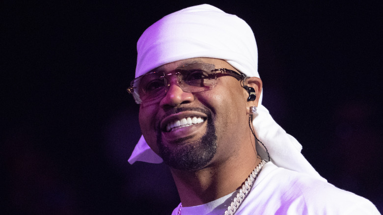 Juvenile smiling in white clothes