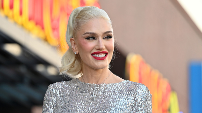 Gwen Stefani walking outdoors on a street in LA.